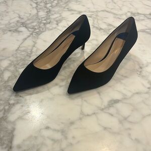 Black suede pumps